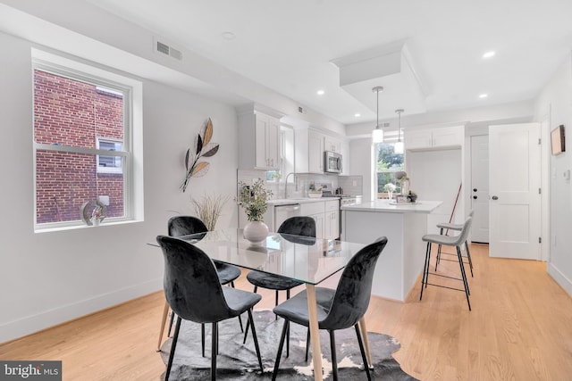 1636 40th St SE, Washington, DC 20020 - dining room with light wood-style floors, recessed lighting, and baseboards