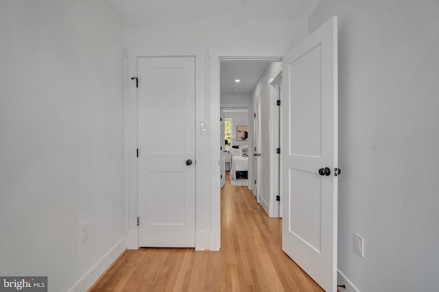 1636 40th St SE, Washington, DC 20020 - hall with light wood finished floors, baseboards, and recessed lighting