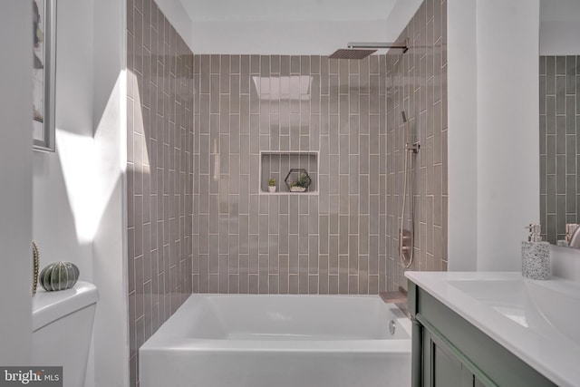 1636 40th St SE, Washington, DC 20020 - bathroom with toilet, vanity, and shower / tub combination