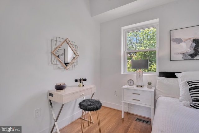 1636 40th St SE, Washington, DC 20020 - bedroom featuring light wood-type flooring and baseboards