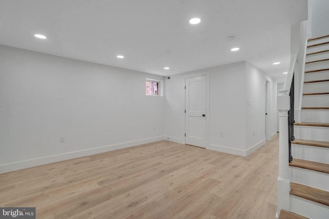 1636 40th St SE, Washington, DC 20020 - basement featuring stairs, recessed lighting, light wood-style floors, and baseboards