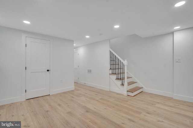 1636 40th St SE, Washington, DC 20020 - finished below grade area with wood finished floors, stairway, recessed lighting, and baseboards