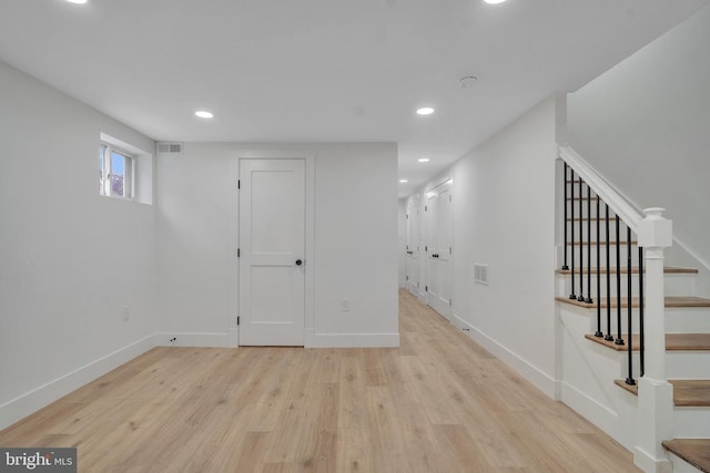 1636 40th St SE, Washington, DC 20020 - below grade area with light wood-type flooring, baseboards, recessed lighting, and stairway