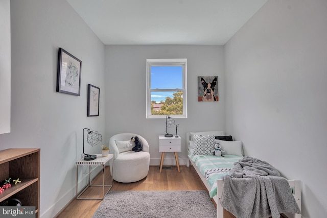 1636 40th St SE, Washington, DC 20020 - bedroom with baseboards and light wood finished floors