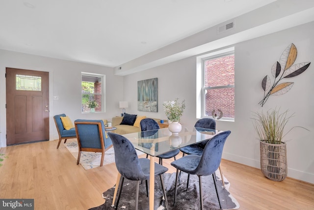 1636 40th St SE, Washington, DC 20020 - dining area with light wood finished floors and baseboards