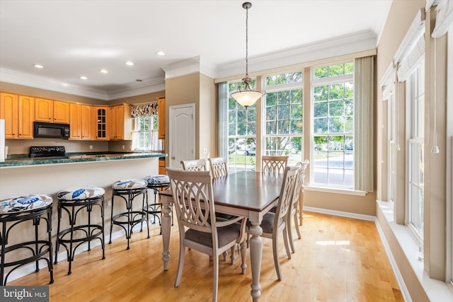 11625 Manklin Creek Rd, Ocean Pines, MD 21811 - dining area featuring crown molding, light wood-style flooring, and recessed lighting