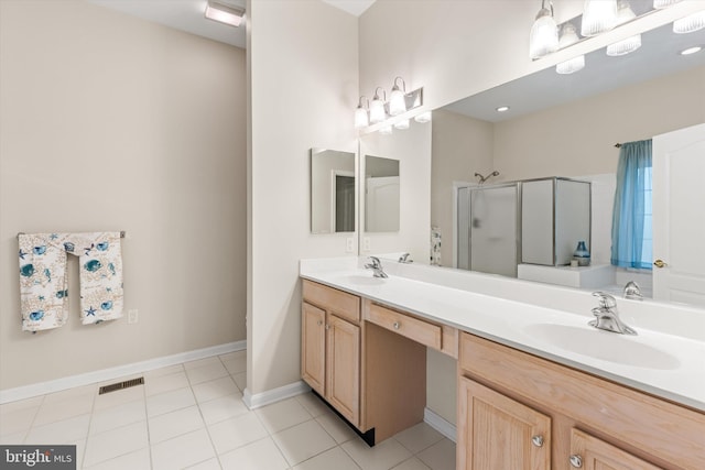 11625 Manklin Creek Rd, Ocean Pines, MD 21811 - bathroom with a stall shower, double vanity, and tile patterned flooring