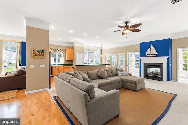 11625 Manklin Creek Rd, Ocean Pines, MD 21811 - living area featuring ceiling fan, crown molding, recessed lighting, and a glass covered fireplace