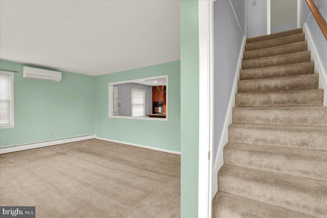 staircase with a wall mounted AC, carpet, baseboards, and a baseboard radiator