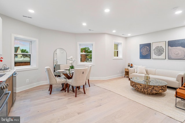 1724 Connecticut Ave NW Unit 8, Washington, DC 20009 - dining room with light wood finished floors, baseboards, and recessed lighting