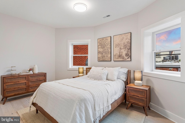1724 Connecticut Ave NW Unit 8, Washington, DC 20009 - bedroom with light wood finished floors and baseboards