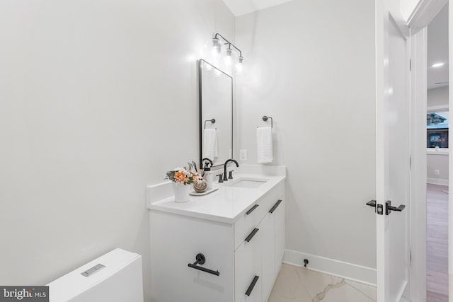 1724 Connecticut Ave NW Unit 8, Washington, DC 20009 - bathroom with marble finish flooring, vanity, and baseboards