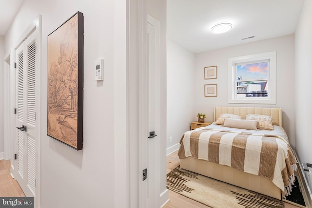 1724 Connecticut Ave NW Unit 8, Washington, DC 20009 - bedroom featuring light wood finished floors, baseboards, and a closet