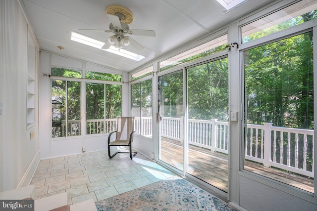 12221 Quadrille Ln, Bowie, MD 20720 - unfurnished sunroom with vaulted ceiling, healthy amount of natural light, a ceiling fan, and a skylight