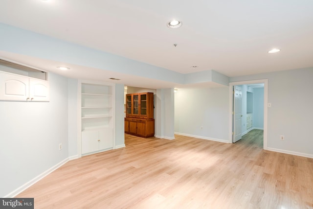 12221 Quadrille Ln, Bowie, MD 20720 - finished below grade area with baseboards, light wood-style flooring, and recessed lighting