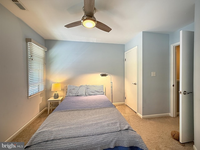 435 Lekites Ave Unit 435, Bethany Beach, DE 19930 - bedroom with light colored carpet, baseboards, and ceiling fan