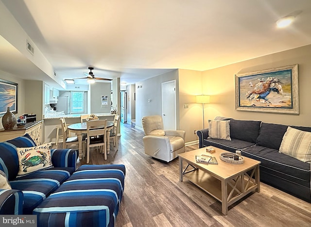 435 Lekites Ave Unit 435, Bethany Beach, DE 19930 - living area with wood finished floors, a ceiling fan, and baseboards