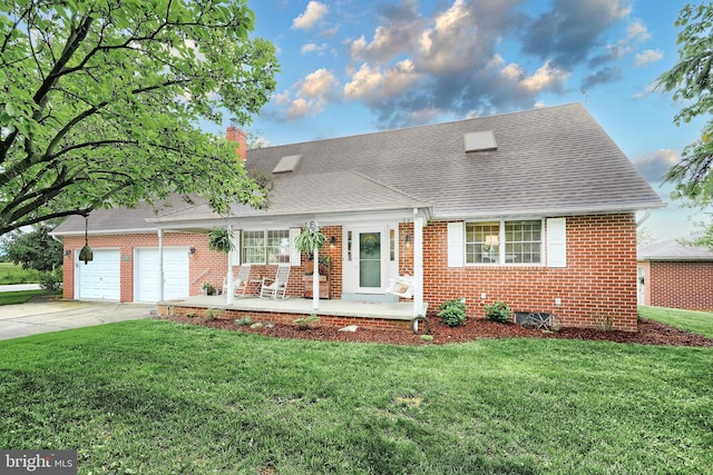 165 Wappler Dr, Hanover, PA 17331 - cape cod-style house with a porch, concrete driveway, a shingled roof, and brick siding