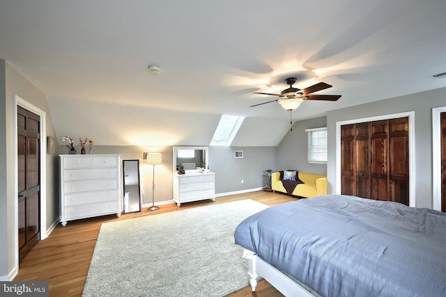 165 Wappler Dr, Hanover, PA 17331 - bedroom with a skylight, baseboards, vaulted ceiling, wood finished floors, and a ceiling fan