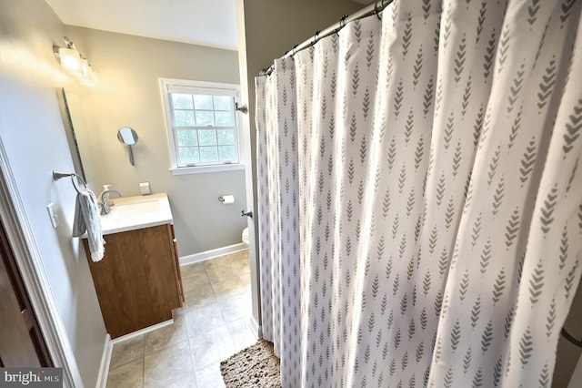 165 Wappler Dr, Hanover, PA 17331 - full bath with vanity, tile patterned flooring, toilet, baseboards, and curtained shower