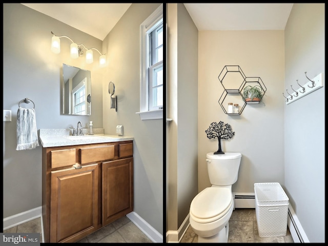 165 Wappler Dr, Hanover, PA 17331 - bathroom featuring baseboard heating, toilet, vanity, and baseboards