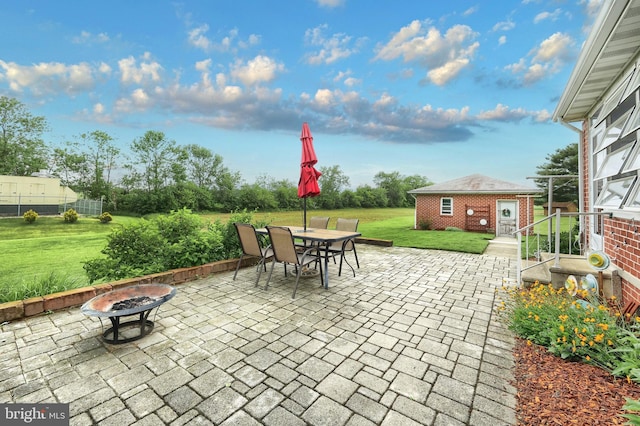 165 Wappler Dr, Hanover, PA 17331 - view of patio / terrace with an outdoor fire pit, outdoor dining area, and an outbuilding
