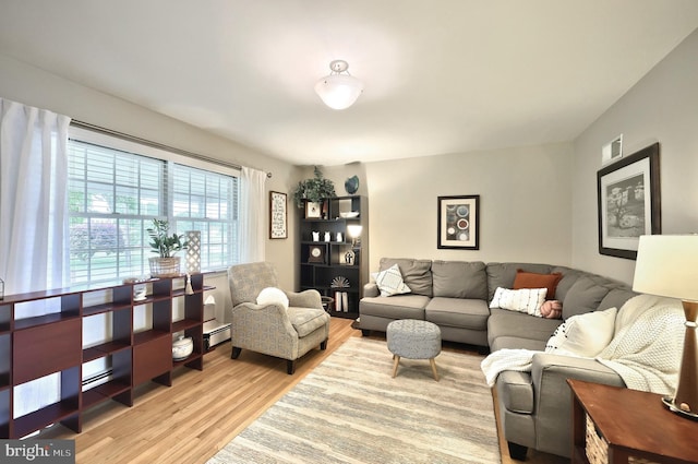 165 Wappler Dr, Hanover, PA 17331 - living area featuring wood finished floors and a baseboard heating unit