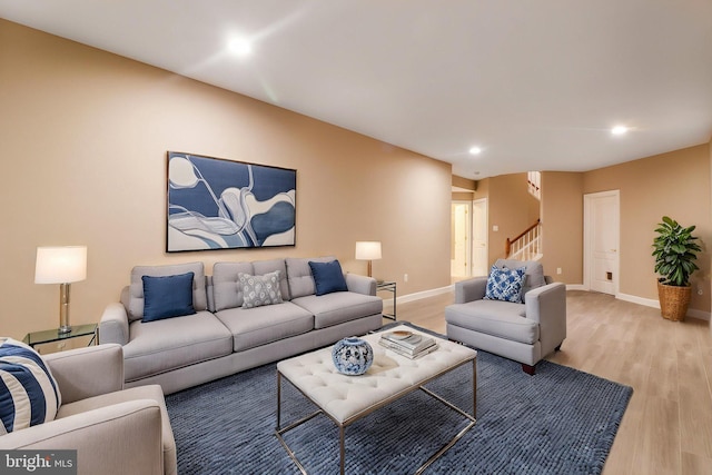 710 Crisfield Way, Annapolis, MD 21401 - living room with light wood-style floors, stairs, recessed lighting, and baseboards