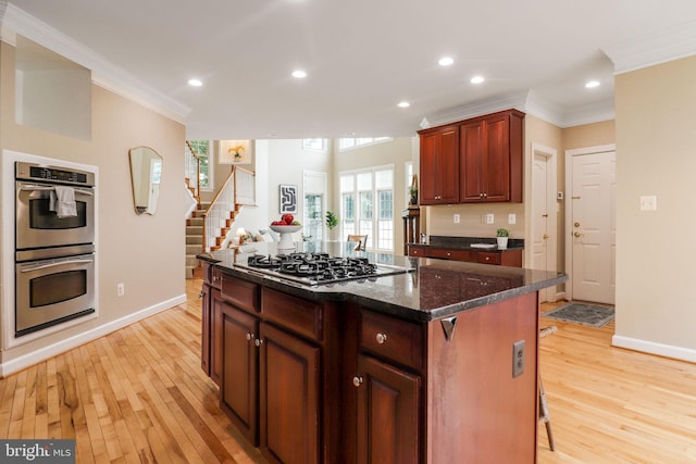 710 Crisfield Way, Annapolis, MD 21401 - kitchen featuring stainless steel appliances, crown molding, light wood-style flooring, baseboards, and recessed lighting