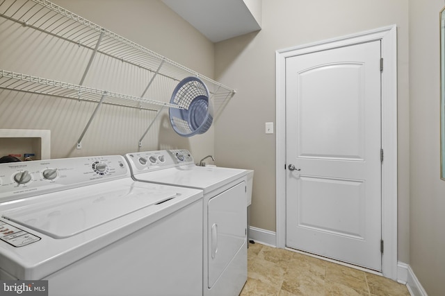 37546 Bella Via Way, Ocean View, DE 19970 - washroom featuring washer and clothes dryer and baseboards