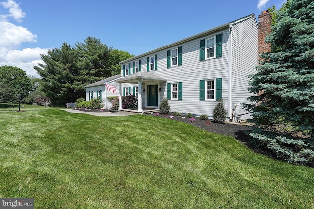 12 Meadow Woods Ln, West Grove, PA 19390 - colonial-style house with a chimney and a front lawn
