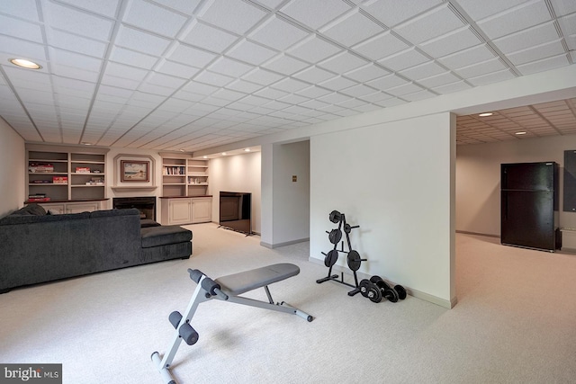 12 Meadow Woods Ln, West Grove, PA 19390 - workout room with carpet, a fireplace, baseboards, built in shelves, and recessed lighting