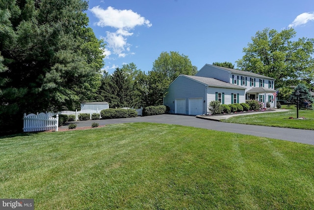 12 Meadow Woods Ln, West Grove, PA 19390 - view of property exterior featuring asphalt driveway and an attached garage