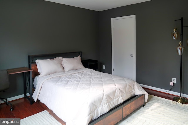 5538 Karen Elaine Unit 1625, Hyattsville, MD 20784 - bedroom featuring wood finished floors and baseboards