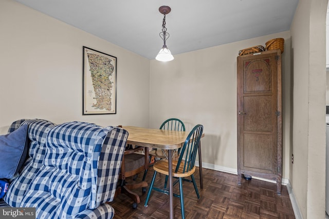 dining space with baseboards