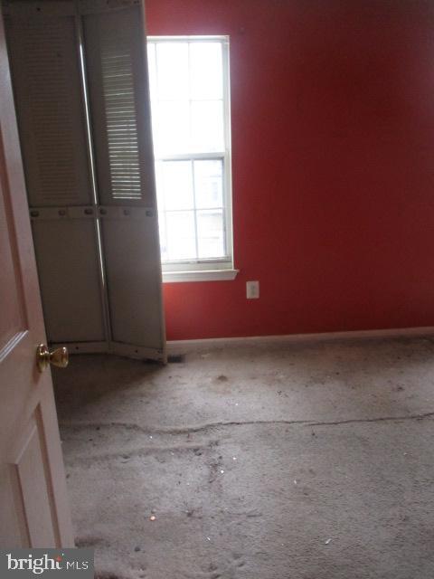 9410 Chippenham Dr, Laurel, MD 20723 - unfurnished room with baseboards and carpet floors