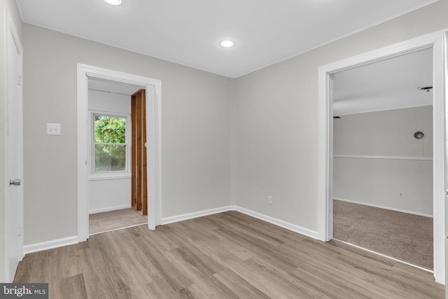 29823 Hillview Dr, Mechanicsville, MD 20659 - unfurnished bedroom featuring light wood-style flooring, baseboards, recessed lighting, and a closet