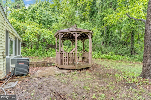 29823 Hillview Dr, Mechanicsville, MD 20659 - view of yard with central AC unit, a gazebo, and a wooded view