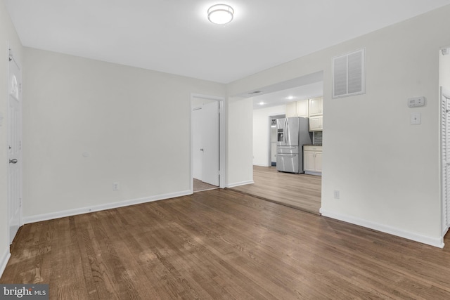29823 Hillview Dr, Mechanicsville, MD 20659 - unfurnished living room with wood finished floors and baseboards