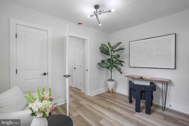 1456 Congress Pl SE, Washington, DC 20020 - office space featuring wood finished floors, baseboards, and a chandelier
