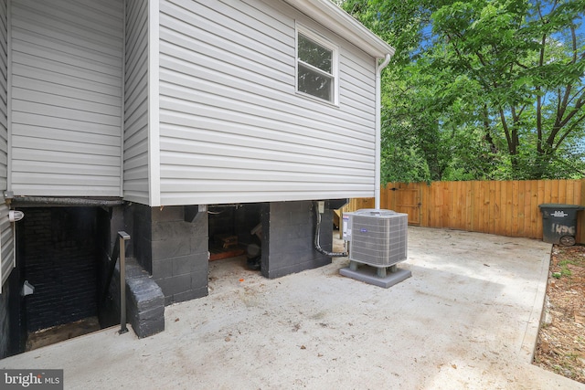 1456 Congress Pl SE, Washington, DC 20020 - view of side of home featuring cooling unit and fence