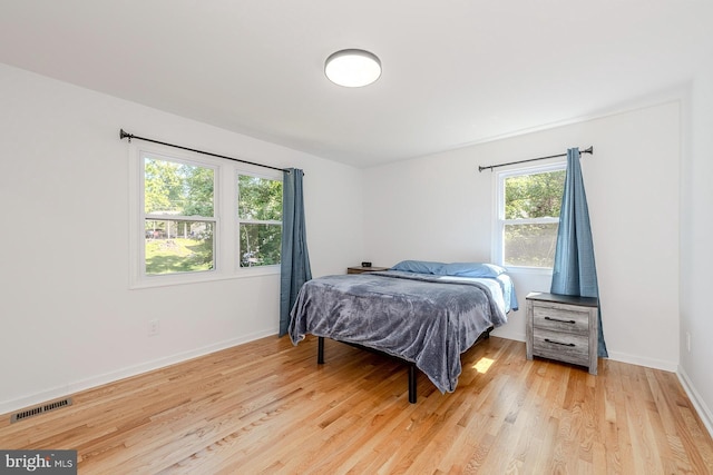 8601 Fort Dr, Manassas, VA 20110 - bedroom featuring light wood finished floors and baseboards
