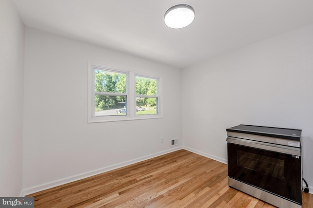 8601 Fort Dr, Manassas, VA 20110 - spare room featuring light wood-style floors and baseboards