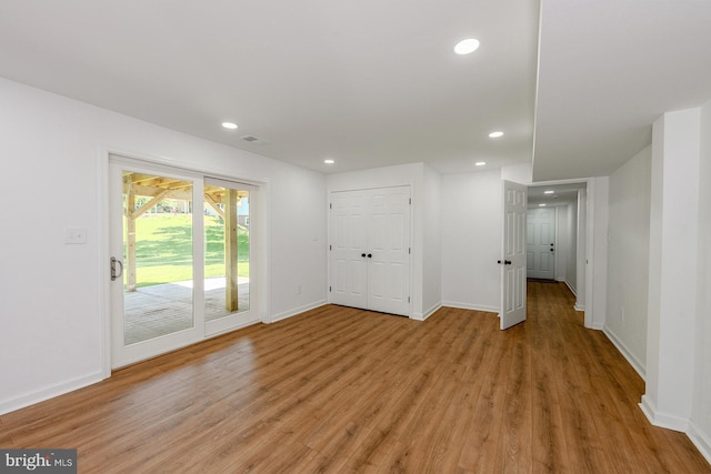 8601 Fort Dr, Manassas, VA 20110 - unfurnished room featuring light wood finished floors, recessed lighting, and baseboards
