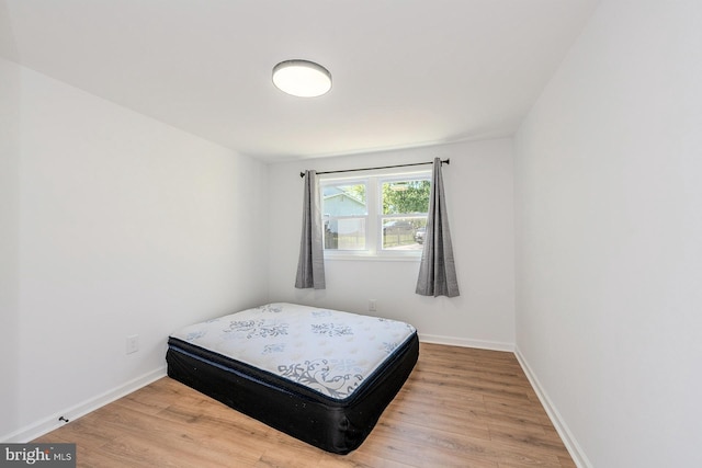 8601 Fort Dr, Manassas, VA 20110 - bedroom featuring wood finished floors and baseboards