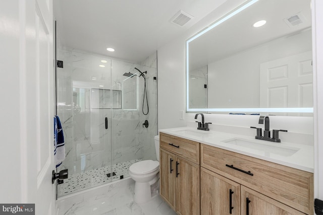 8601 Fort Dr, Manassas, VA 20110 - full bathroom with a marble finish shower, marble look tile flooring, double vanity, toilet, and recessed lighting