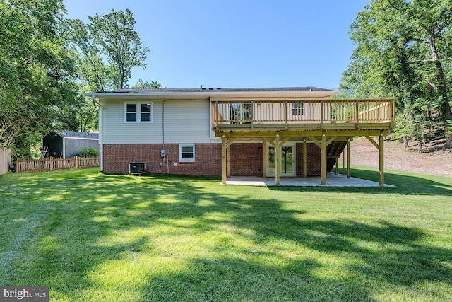 8601 Fort Dr, Manassas, VA 20110 - back of house with a deck, a patio area, central AC, and brick siding