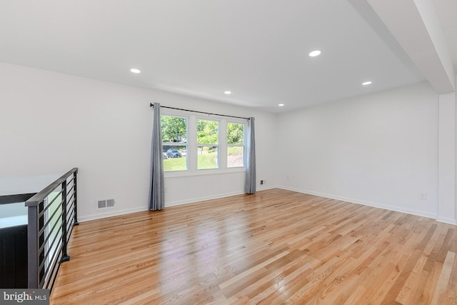 8601 Fort Dr, Manassas, VA 20110 - unfurnished room with light wood-type flooring, recessed lighting, and baseboards