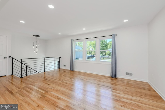 8601 Fort Dr, Manassas, VA 20110 - spare room with wood finished floors, recessed lighting, and baseboards