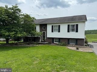 14600 Barton Blvd SW, Cresaptown, MD 21502 - split foyer home featuring a front lawn and asphalt driveway